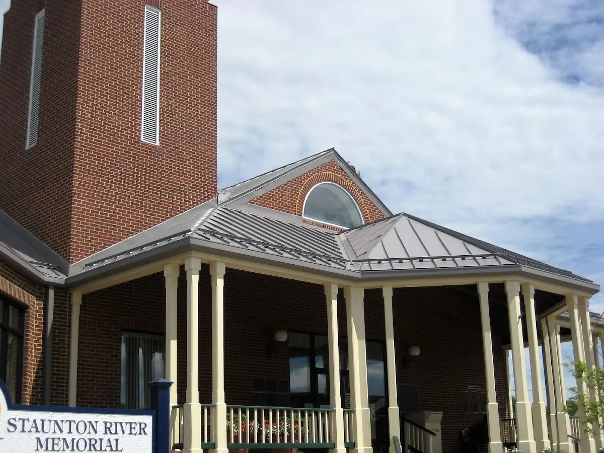 Skilled roofing craftsmen working on a residential roof in Grantville